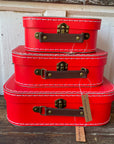 Red Cardboard Suitcases