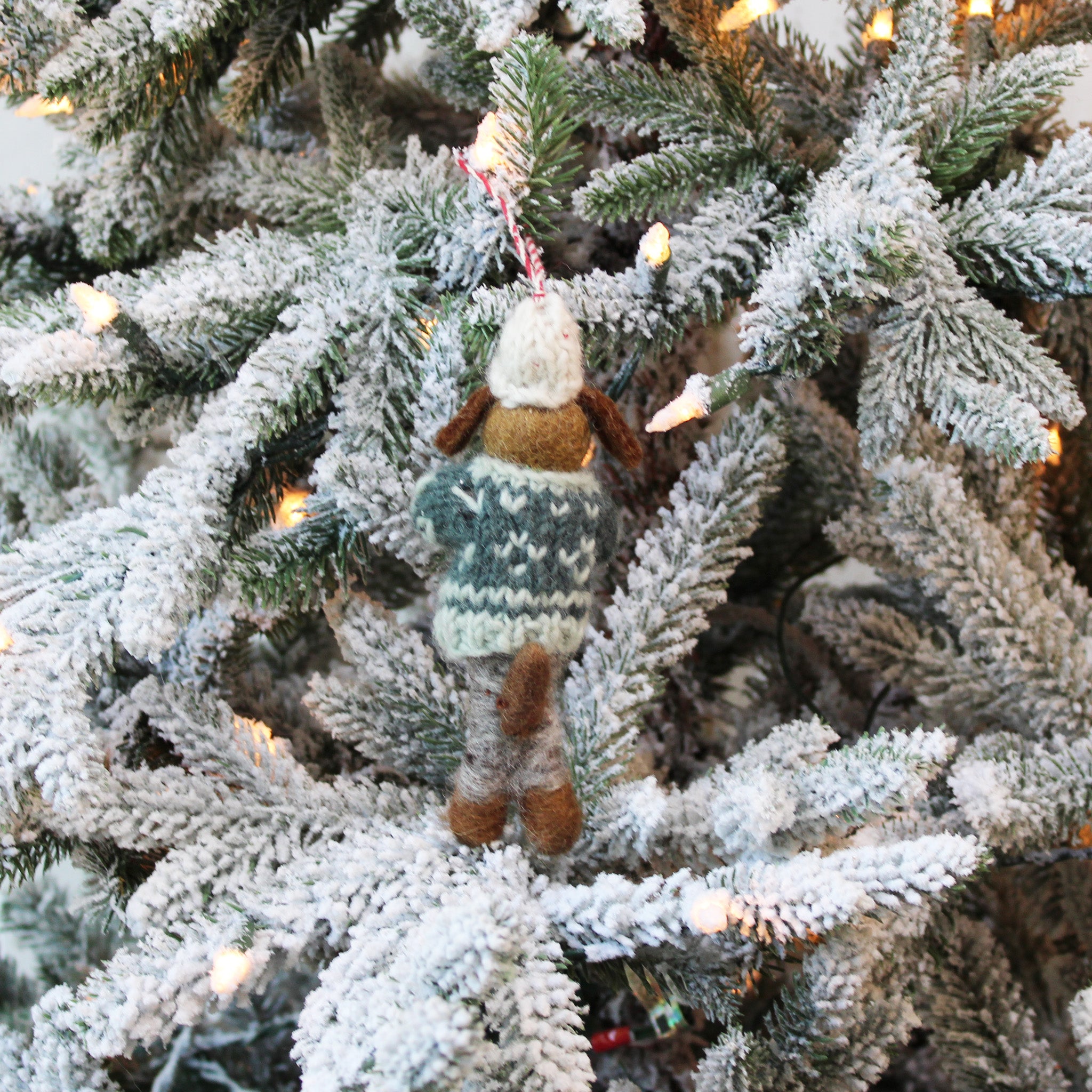Dog Holding a Gift Ornament