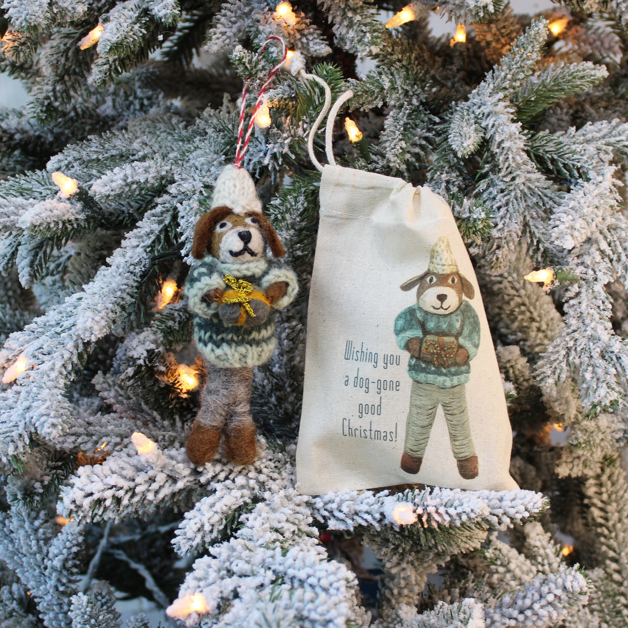 Dog Holding a Gift Ornament