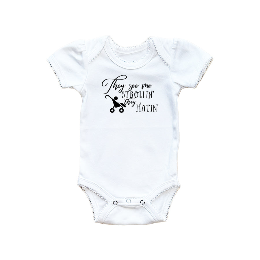 They See Me Strollin' Baby Onesie